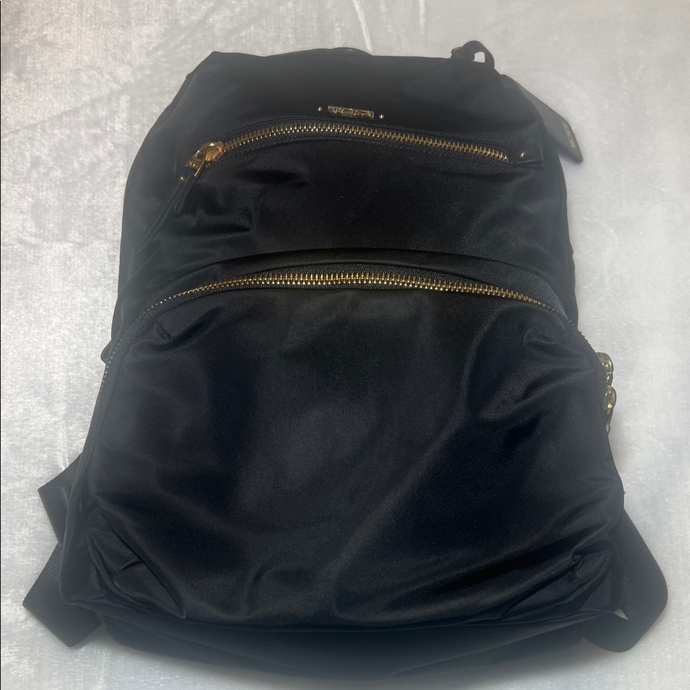 Tumi Halle Black Backpack With Gold Accents